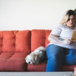 woman sitting on sofa